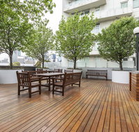 of SouthbankLight filled apartmentHUGE private terrace with city viewsParkingPoolGymWiFi